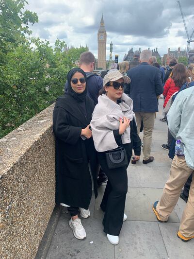 Serreen and Nouf Abdullah queue to see the queen lying in state. The National 
