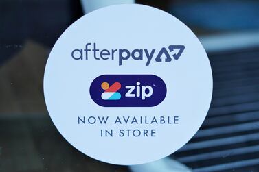 A logo for Afterpay and Zip on a store window in Sydney, Australia. The companies are among a handful of alternative credit firms which offer small loans, mostly to online shoppers, and make their money by charging merchants commission. Reuters