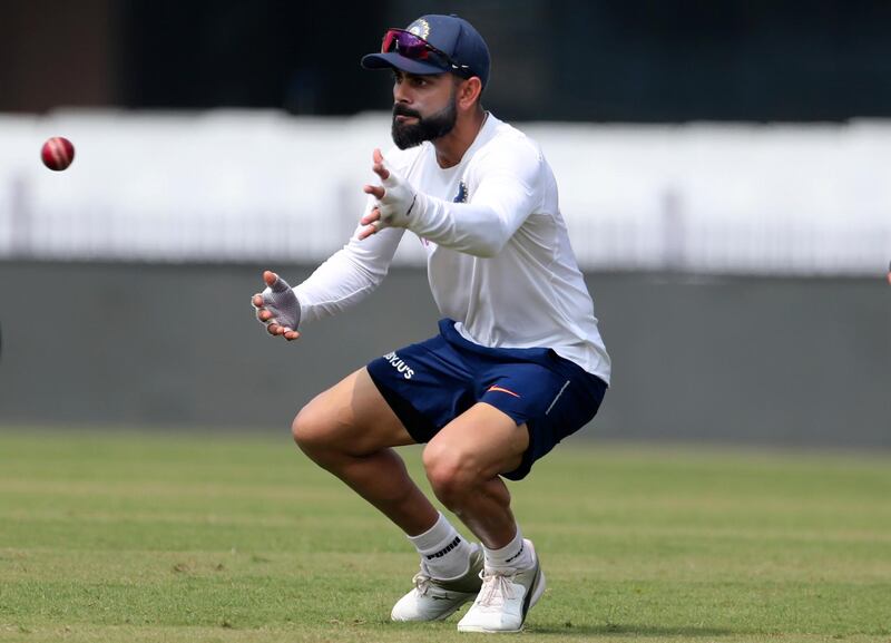 India's captain Virat Kohli prepares to catch the ball during a training session ahead of their third and last cricket test match against South Africa in Ranchi, India, Friday, Oct. 18, 2019. (AP Photo/Aijaz Rahi)