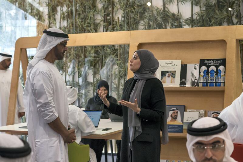 DUBAI, UNITED ARAB EMIRATES - September 17, 2017: HH Sheikh Mohamed bin Zayed Al Nahyan, Crown Prince of Abu Dhabi and Deputy Supreme Commander of the UAE Armed Forces (L) and HE Ohood Al Roumi, UAE Minister of State for Happiness (R), visit Government Accelerators headquarters.

( Mohamed Al Hammadi / Crown Prince Court - Abu Dhabi )
---