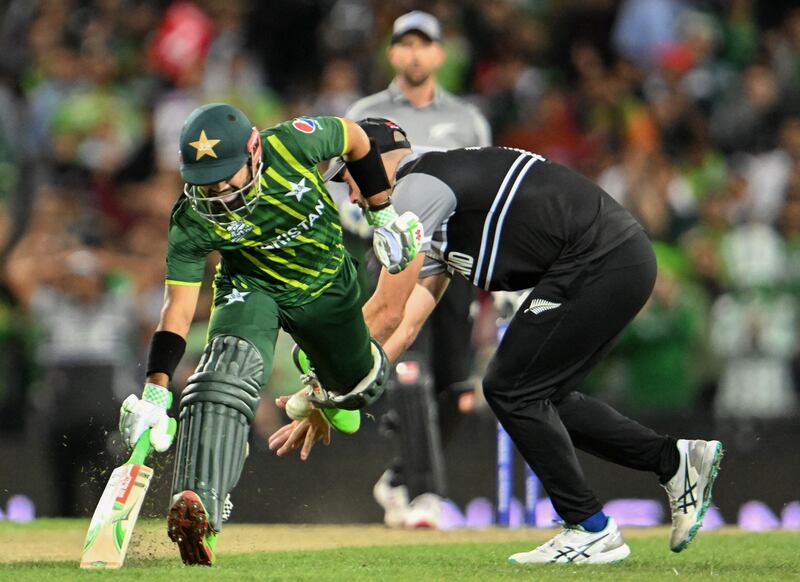 Pakistan batter Muhammad Rizwan makes his ground during the semi-final. AFP