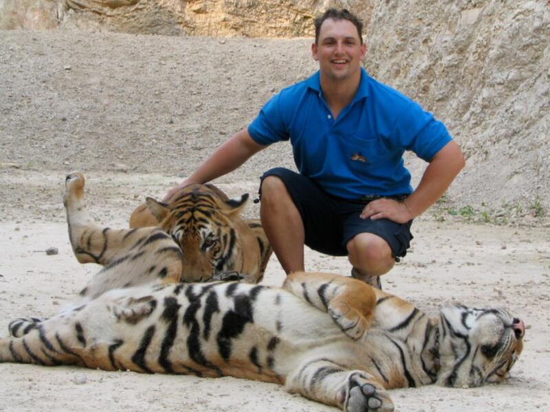 Armed with only a toilet brush, Rob Punton says he can make a better life for big cats kept in private collections in the UAE.