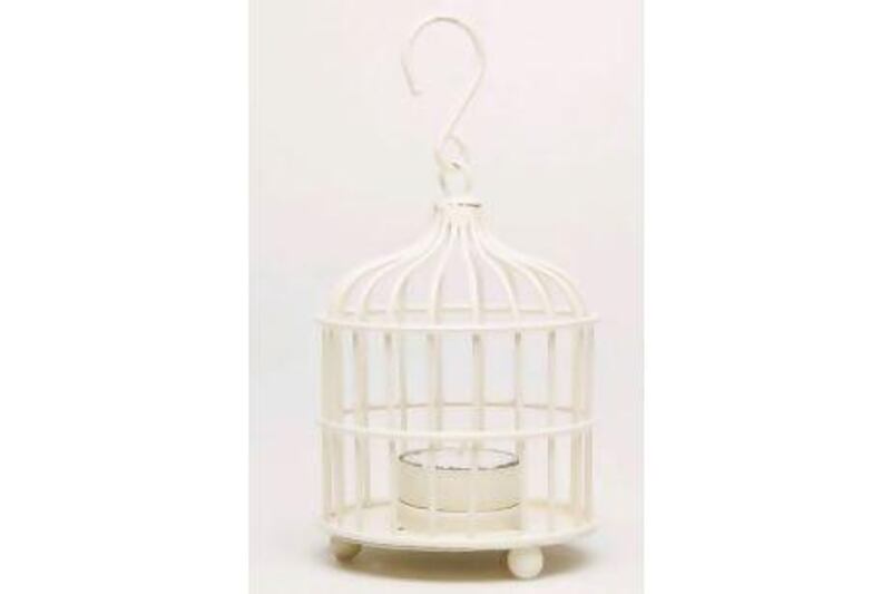 Bird cage candle holder. Tina Chang / The National