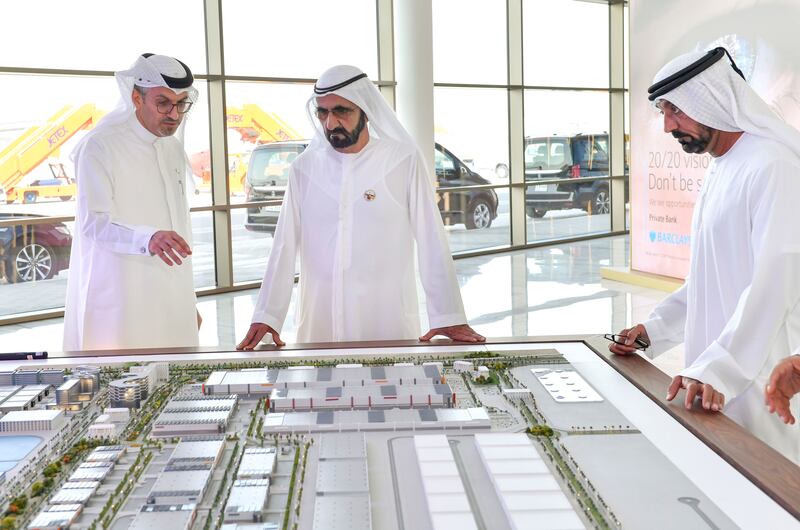 Sheikh Mohammed is shown a scale model of the Dubai Air City project in January 2019. Wam