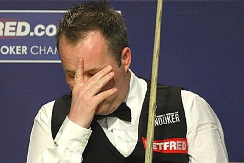John Higgins was accused of agreeing to accept money for arranging the outcome of four frames in matches to be played later.