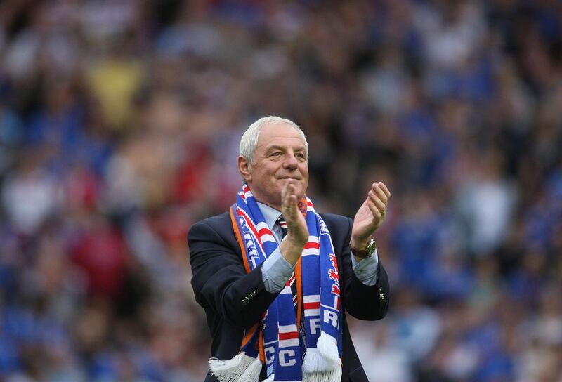 Rangers manager Walter Smith applauds the fans during the victory parade at Ibrox Stadium on May 24, 2009. PA