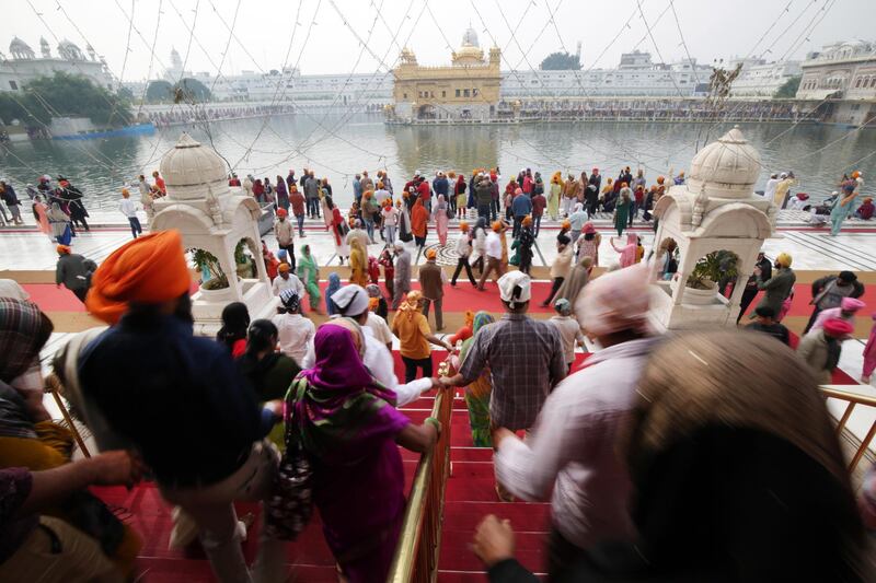 Devotees visit to pay obeisance at the Golden Temple, the holiest of Sikh places on the occasion of the 550th birth anniversary of the first Sikh Guru or master, Sri Guru Nanak Dev Ji in Amritsar, India.  EPA