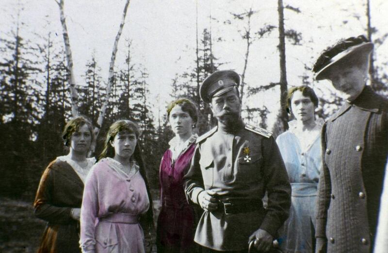 Tsar Nicholas II with daughters, left to 2nd right, Maria, Anastasia, Olga and Tatiana Romanov. They were executed by Bolsheviks on July 17, 1918. Laski Diffusion / Getty Images