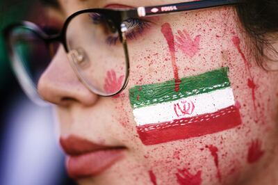 A protester at a rally in Berlin in solidarity with Iranian protests following the death of Mahsa Amini. EPA