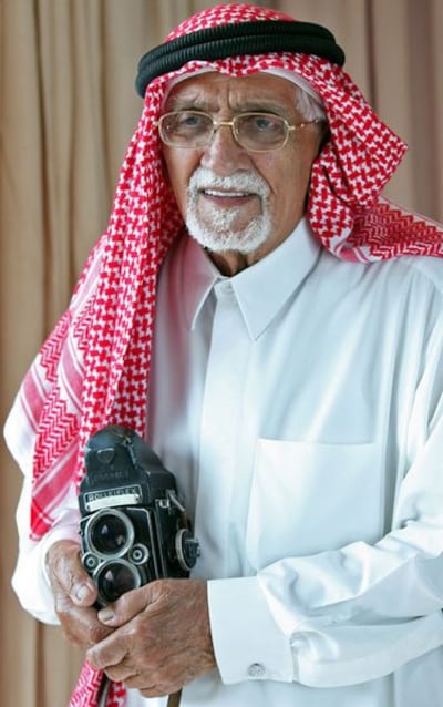 Noor Ali Rashid, the former official royal photographer, with one of his first cameras.