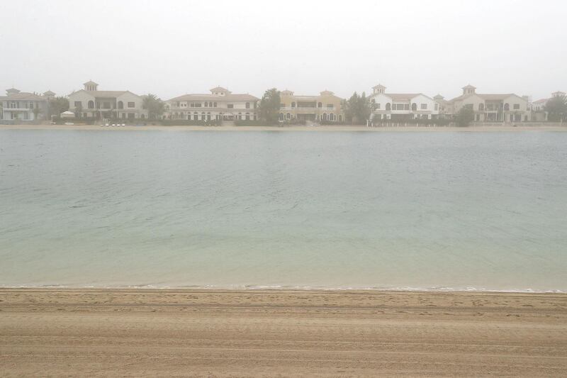 DUBAI , UNITED ARAB EMIRATES , February 03 – 2019 :- View of the villas during the dusty and windy weather on Palm Jumeirah in Dubai. ( Pawan Singh / The National ) For News. 