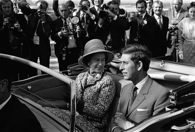 Queen Elizabeth II and Charles, Prince of Wales travel in an open top car in Avignon during a state visit to France, May 1972. (Photo by Reg Lancaster/Express/Hulton Archive/Getty Images)
