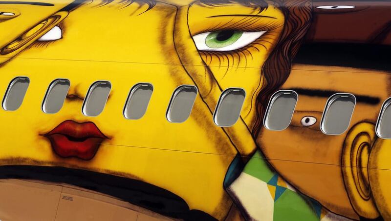 A close-up view at the design of the plane, created by twin Brazilian artists 'Os Gemeos'. Nacho Doche / Reuters / May 27, 2014