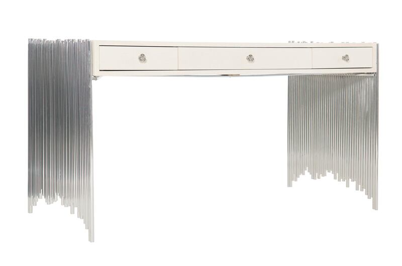 If you'd rather go glam, the Calista desk could double up as a dressing table once your remote working days are behind you. Perched on conjoining stainless steel rods of varying lengths, it'll make quite the statement in your space.  
Calista desk, Dh12,300, www.interiorsfurniture.com