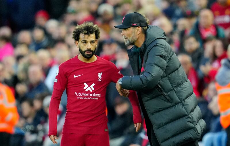 Liverpool manager Jurgen Klopp gives instructions to Mohamed Salah. AP