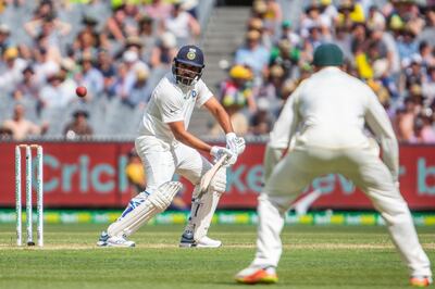 India's Rohit Sharma plays a cut shot during a play on day two of the third cricket test between India and Australia in Melbourne, Australia, Thursday, Dec. 27, 2018. (AP Photo/Asanka Brendon Ratnayake)