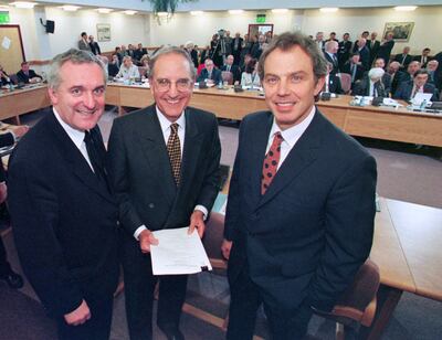 Bertie Ahern, left, US senator George Mitchell, centre, and Tony Blair, right, after the Good Friday Agreement was signed in 1998. PA