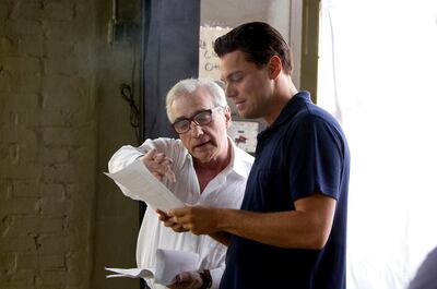 Left to right: Director/Producer Martin Scorsese discusses a scene with Leonardo DiCaprio (who plays Jordan Belfort) on the set of THE WOLF OF WALL STREET, from Paramount Pictures and Red Granite Pictures.