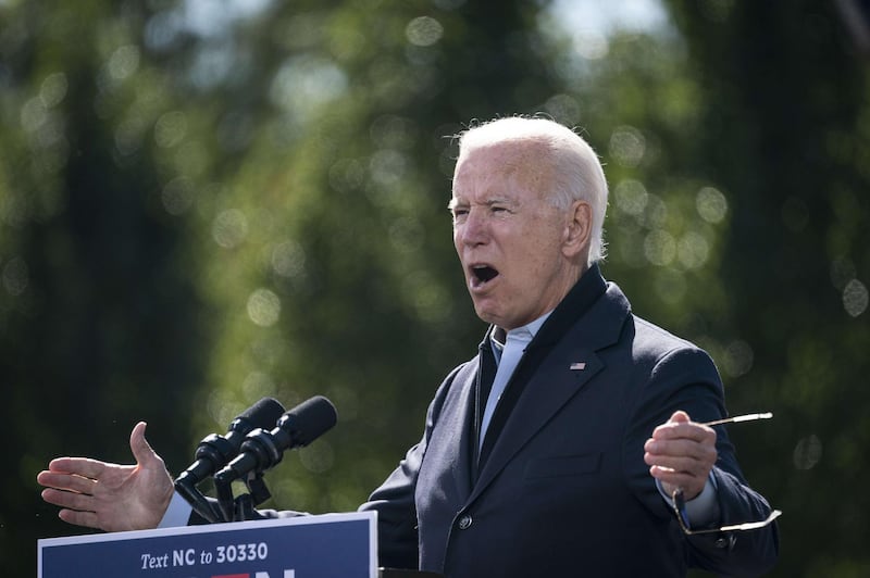 Democratic presidential nominee Joe Biden speaks during a drive-in campaign rally at Riverside High School in Durham, North Carolina. AFP