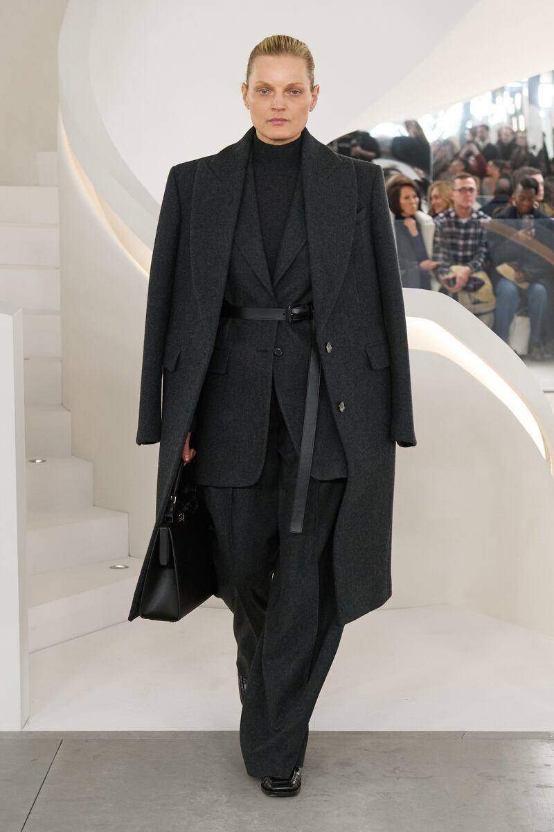 Sharp city suiting cinched with a long skinny belt. Photo: Michael Kors