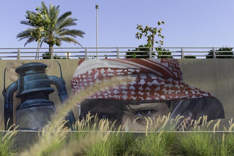 Murals line the E10 motorway in Al Raha in Abu Dhabi. Christopher Pike / The National