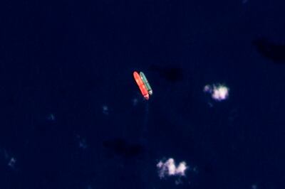 The oil cargo was purported to have been transferred from the Suez Rajan, right, to the Virgo in this operation in the South China Sea in February. AP