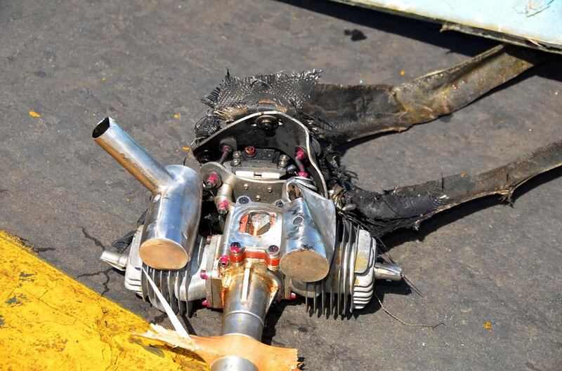This handout image provided by Saudi Arabia's Ministry of Media on February 10, 2021 reportedly shows the wreckage of an unmanned aerial vehicle (UAV or drone) that was used in an attack on Abha International Airport in Saudi Arabia's southern Asir province. A civilian plane was engulfed in flames on February 10 after Yemen's Huthi rebels launched a drone strike on the airport days after the US moved to delist the insurgents as "terrorists". Saudi authorities did not immediately report any casualties from the attack, claimed by the Huthis, the latest in a series of rebel assaults on the kingdom despite a renewed American push to de-escalate the six-year conflict. - === RESTRICTED TO EDITORIAL USE - MANDATORY CREDIT "AFP PHOTO / HO / SAUDI MINISTRY OF MEDIA" - NO MARKETING NO ADVERTISING CAMPAIGNS - DISTRIBUTED AS A SERVICE TO CLIENTS ===
 / AFP / Saudi Ministry of Media / - / === RESTRICTED TO EDITORIAL USE - MANDATORY CREDIT "AFP PHOTO / HO / SAUDI MINISTRY OF MEDIA" - NO MARKETING NO ADVERTISING CAMPAIGNS - DISTRIBUTED AS A SERVICE TO CLIENTS ===
