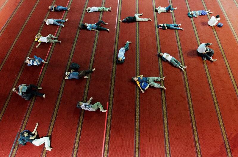 Muslim men rest inside Istiqlal mosque on the last day of Ramadan in Jakarta, Indonesia. Reuters
