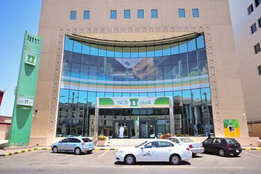 Saudi Arabia’s National Commercial Bank, reported a 22 per cent drop in its second-quarter profit.  Michael Bou-Nacklie for The National
