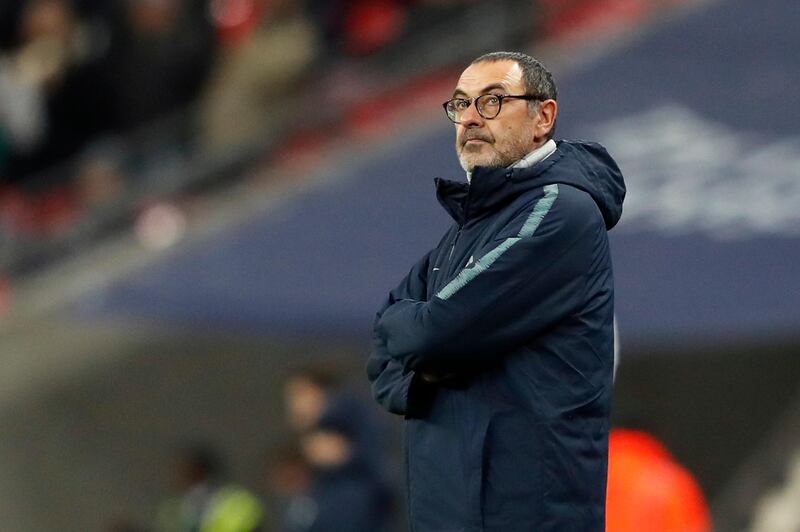 Chelsea's team manager Maurizio Sarri stands on the side of the pitch prior to the English League Cup semifinal first leg soccer match between Tottenham Hotspur and Chelsea at Wembley Stadium in London, Tuesday, Jan. 8, 2019. (AP Photo/Frank Augstein)