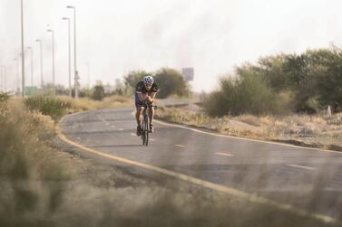 A cyclist on Al Qudra track starting his ride at 6am Reem Mohammed / The National