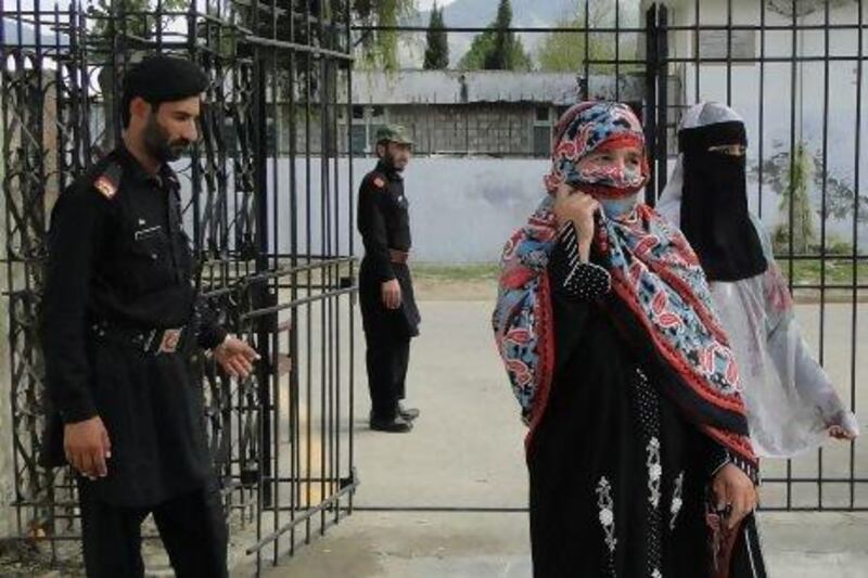 Badam Zari, second from right, leaves the election office after filing her candidacy for Parliament in Khar, the capital of the Pakistani tribal area of Bajur.