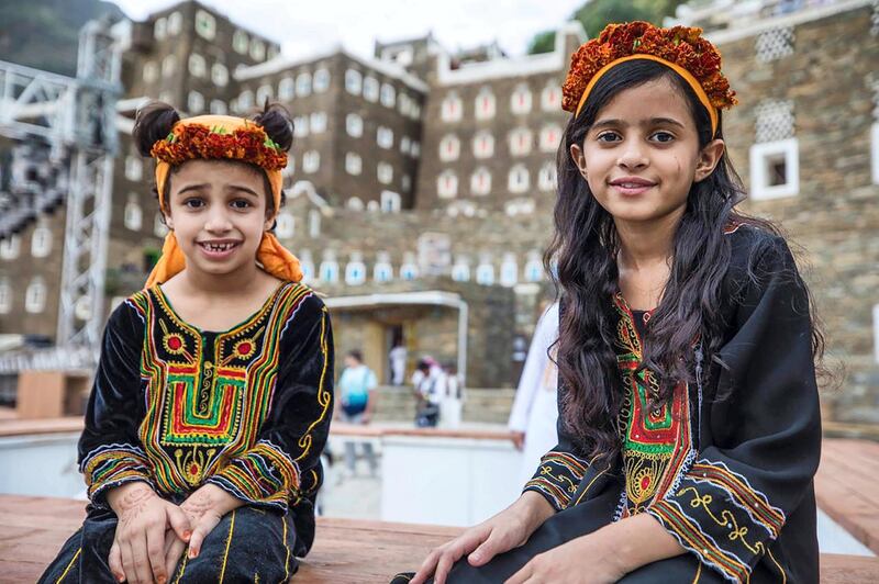 The girls and women in the community also wear garlands. Courtesy of Saudi MOC