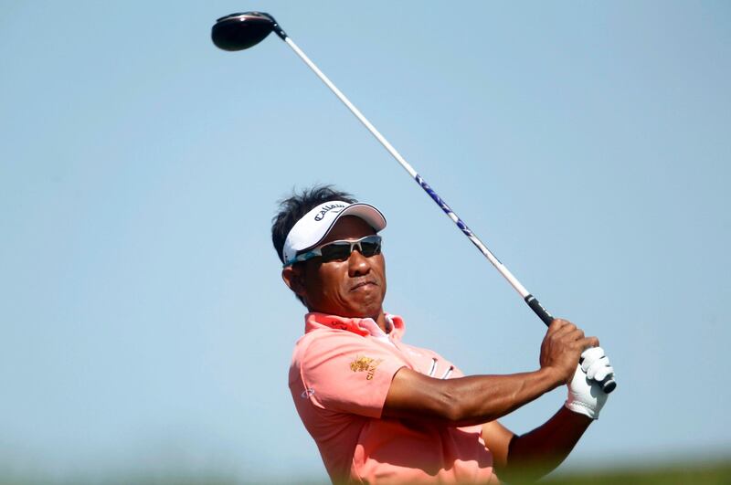 Thongchai Jaidee of Thailand watches his shot from the third tee during the fourth and final round of the Abu Dhabi Golf Championship at the Abu Dhabi Golf Club January 20, 2013. REUTERS/Jumana ElHeloueh (UNITED ARAB EMIRATES - Tags: SPORT GOLF) *** Local Caption ***  ABD07_GOLF-_0120_11.JPG