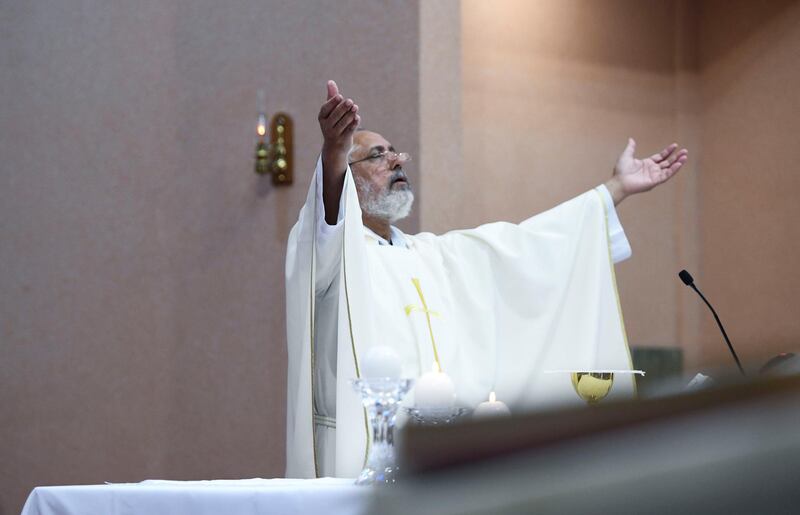 Abu Dhabi, United Arab Emirates - Father Habib, guest from Pakistan conducts 8am Christmas mass at St. JosephÕs Cathedral, Mushrif. Khushnum Bhandari for The National