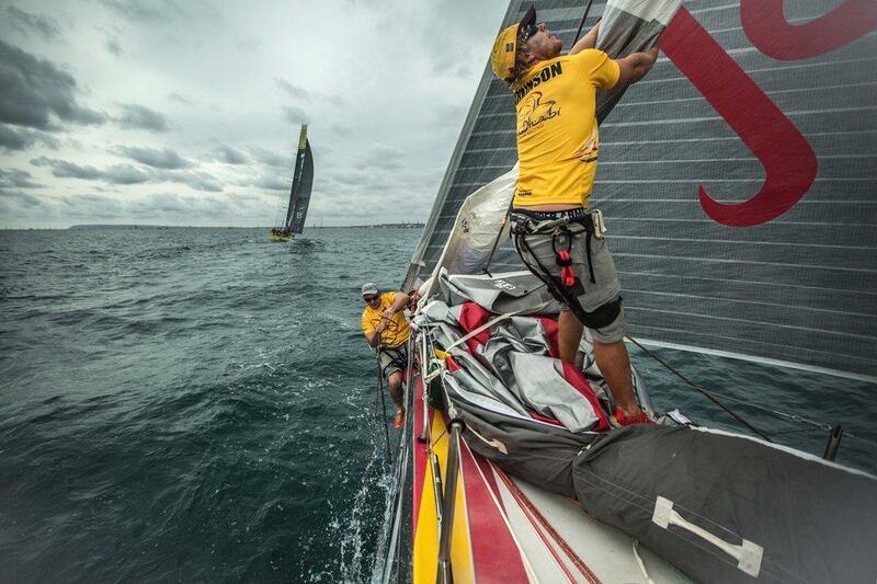 Luke Parkinson, near, and another member of the Azzam crew shown in action during the start of Leg 1 to the 2014/15 Volvo Ocean Race on Saturday in Alicante, Spain. Matt Knighton / Getty Images / Abu Dhabi Ocean Racing / Volvo Ocean Race / October 11, 2014