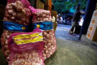 Garlic imported from China is pictured for sale at a traditional market. Courtesy: Reuters  