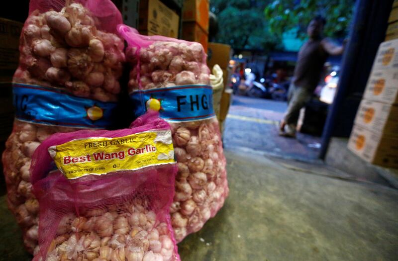 Garlic imported from China is pictured for sale at a traditional market, as Indonesian government will temporarily stop food and beverage imports from China as a precaution to prevent the coronavirus spreading to the Southeast Asian country, in Jakarta, Indonesia, February 3, 2020. REUTERS/Ajeng Dinar Ulfiana
