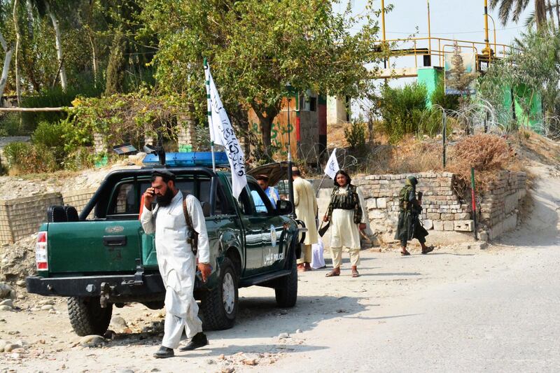 Taliban members inspect the site of a blast in Jalalabad, Afghanistan, on September 18, 2021. At least two people were killed in the explosion and about 20 injured. Photo: AFP