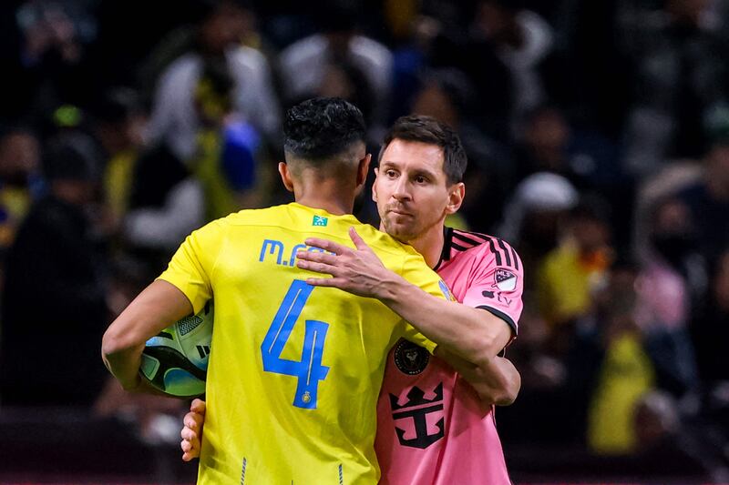Inter Miami's Lionel Messi embraces Al Nassr defender Mohammed Al Fatil at the final whistle. AFP