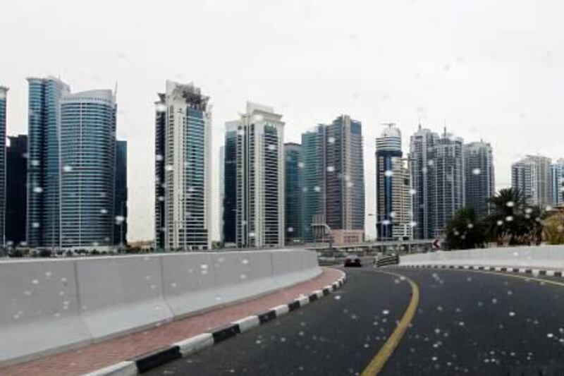 Rainfall in Dubai is rare enough but is almost unheard of in August, so the downpour after a cloud-seeding experiment seemed a success – yet scientists are working on a computer model to test the results further. Sarah Dea /The National