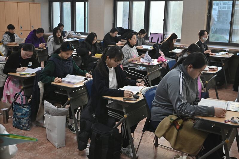 South Korea came fourth in the reading rankings on the 2022 Pisa report. AFP