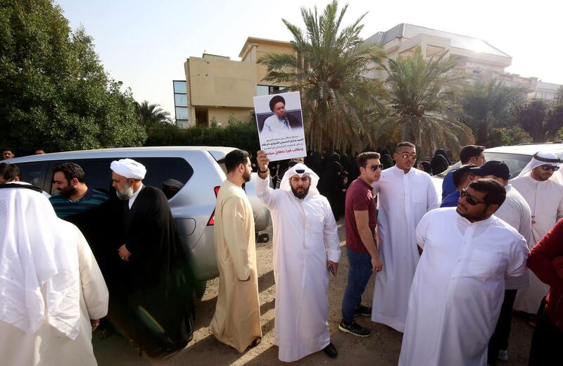 Kuwaiti Shiites gather before the Iranian embassy in Kuwait City on March 7, 2018 to demonstrate calling for the release of Iranian Shiite cleric Hossein al-Shirazi, who was arrested in the Iranian Shiite holy city of Qom a month prior. / AFP PHOTO / YASSER AL-ZAYYAT