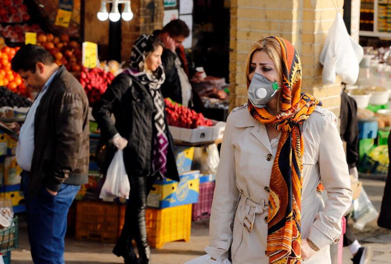 Iranians wearing face masks and protective gloves go shopping in a bazaar during the coronavirus pandemic in Tehran, Iran. Media reported the Iranian economy is effected by Covid-19 coronavirus crises as many people started to self-quarantine and to stop going out as much as they can. According to the last report by the Ministry of Health, 10,075 people were diagnosed with the Covid-19 coronavirus and 429 people have died in Iran.  EPA