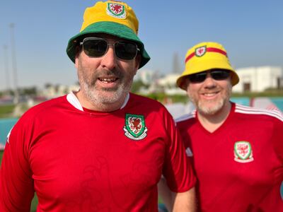 Nick and Adrian from Wrexham, Wales, reckon their side can go all the way in the country's first World Cup since 1958. Andy Scott / The National