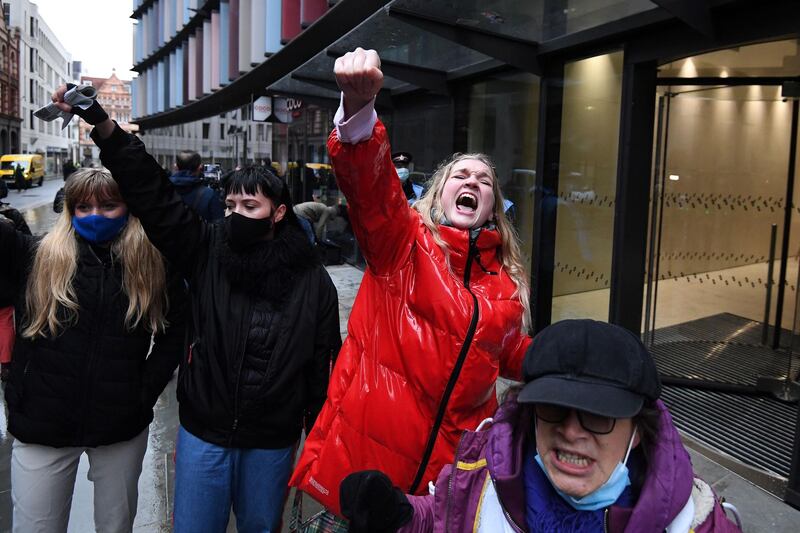 Supporters of Wikileaks founder Julian Assange celebrate outside the Old Bailey. AFP