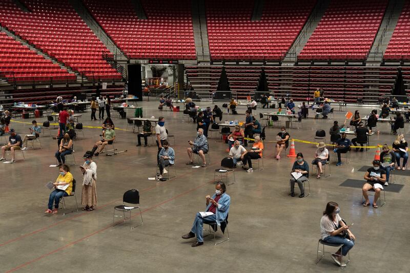 A community vaccination clinic administering doses of the Pfizer-BioNTech Covid-19 vaccine inside the Viejas Arena on the campus of San Diego State University in San Diego, California, U.S. Starting April 1, Californians ages 50 and older are eligible to get the Covid-19 vaccine. Bloomberg