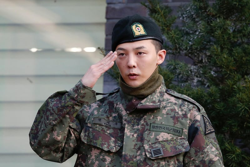 Leader of South Korean K-pop boyband Big Bang G-Dragon leaves after being discharged from army in Yongin, South Korea, October 26, 2019. REUTERS/Heo Ran