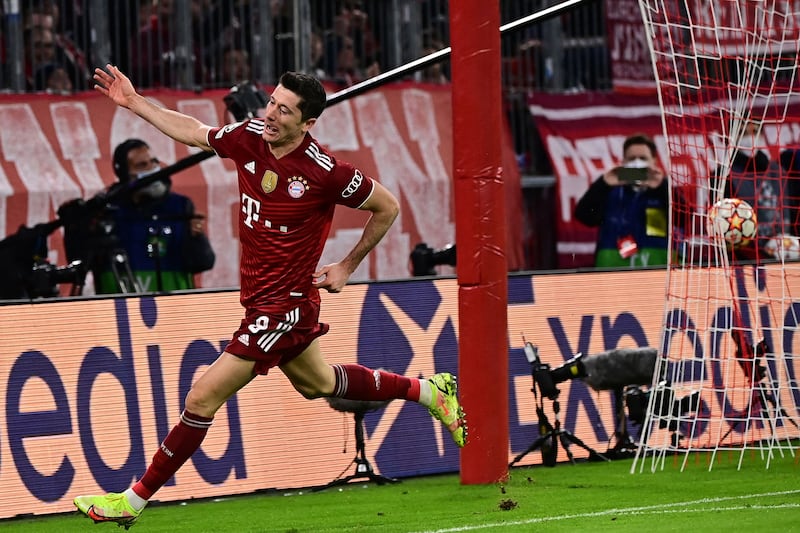 Lewandowski celebrates scoring his team's fourth goal. AFP