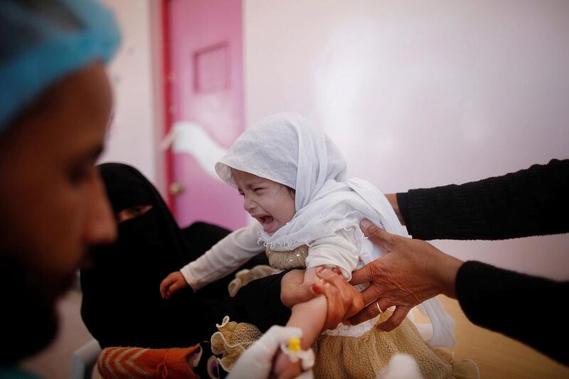 A girl cries as she is treated at a cholera treatment centre in Sanaa, Yemen, on October 29, 2016. Khaled Abdullah / Reuters